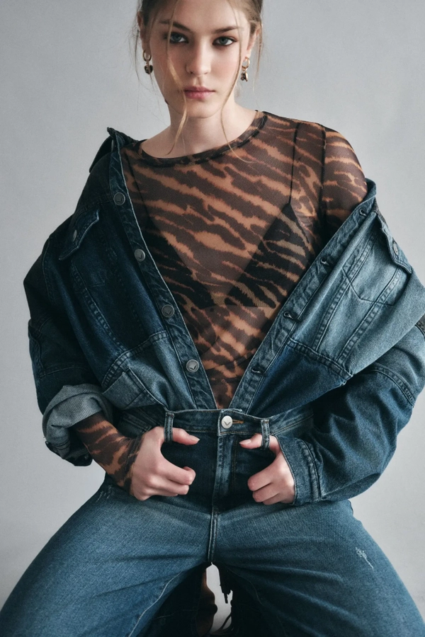 remera mesh animal cebra