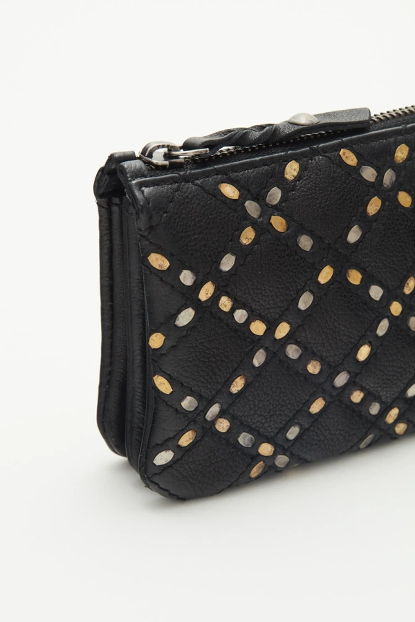 billetera harry studs